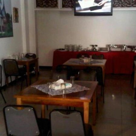 Ambun Suri Hotel Букитинги Екстериор снимка